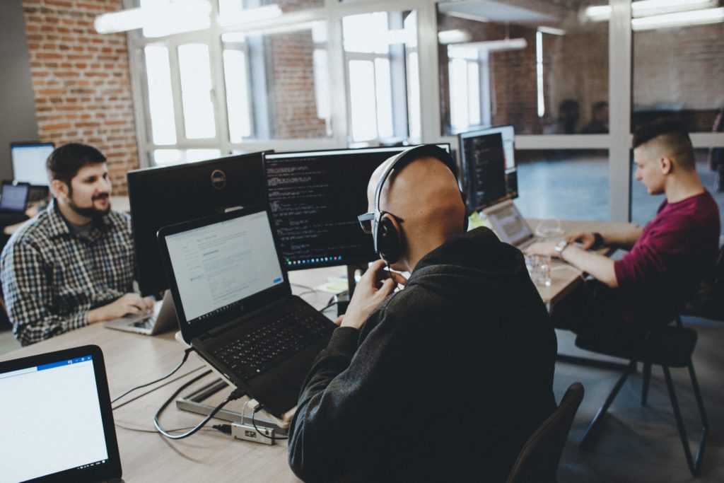 NerdySoft team coding. Java software development services.